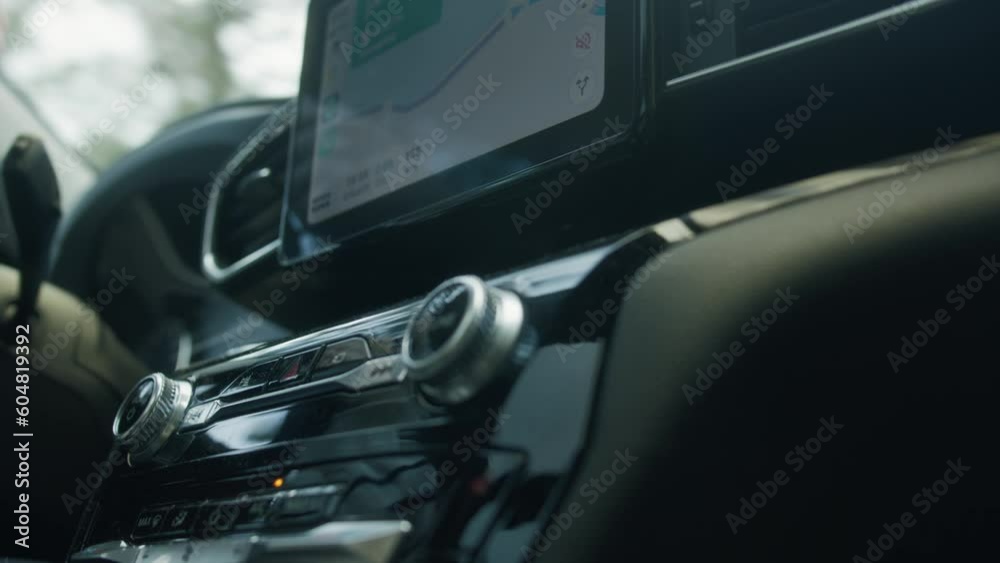 The car radio gleams with polished perfection, its sleek surface reflecting surrounding scenery and illuminating the interior, blending with captivating reflections of the world outside. The car radio gleams with polished perfection, its sleek surface reflecting surrounding scenery and illuminating the interior, blending with captivating reflections of the world outside.