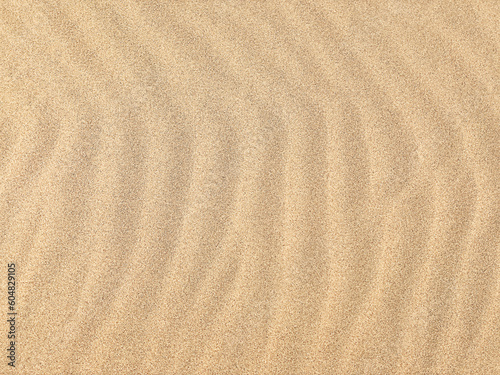  Sand. Texture, surface of sea sand. Natural background. Waves of sand. Seascape. Dunes. Copy space 