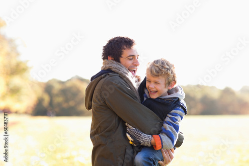 Father and son playing outdoors