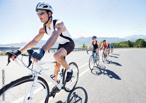 Cyclists in race on rural road