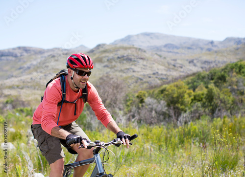 Mountain biker in rural landscape