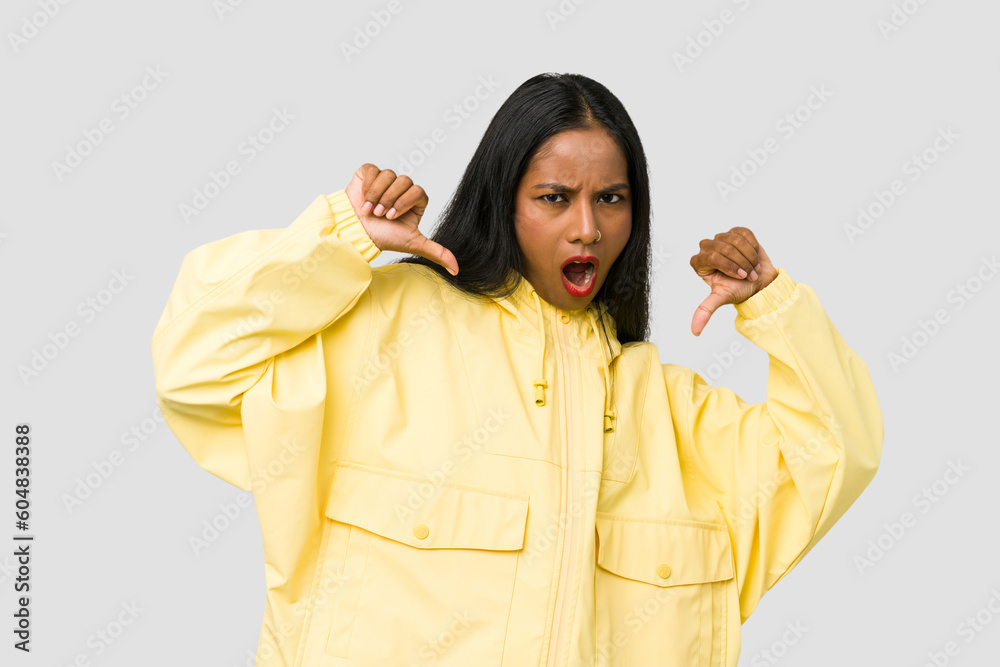 Young Indian woman cut out isolated on white background feels proud and self confident, example to follow. Young Indian woman cut out isolated on white background feels proud and self confident, example to follow.