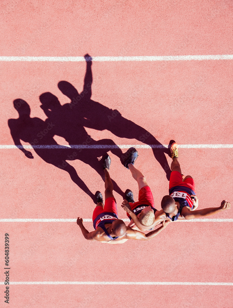 Runners walking with arms around each other on track - obrazy, fototapety, plakaty 