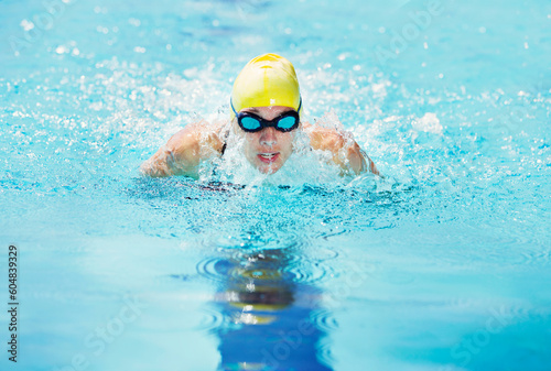 Swimmer wearing goggles in pool