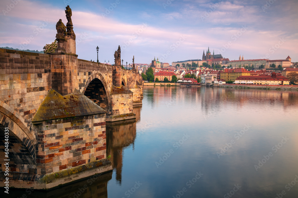 Prague, Czech Republic. Cityscape image of Prague, capital city of Czech Republic, with the iconic Charles Bridge at sunrise.