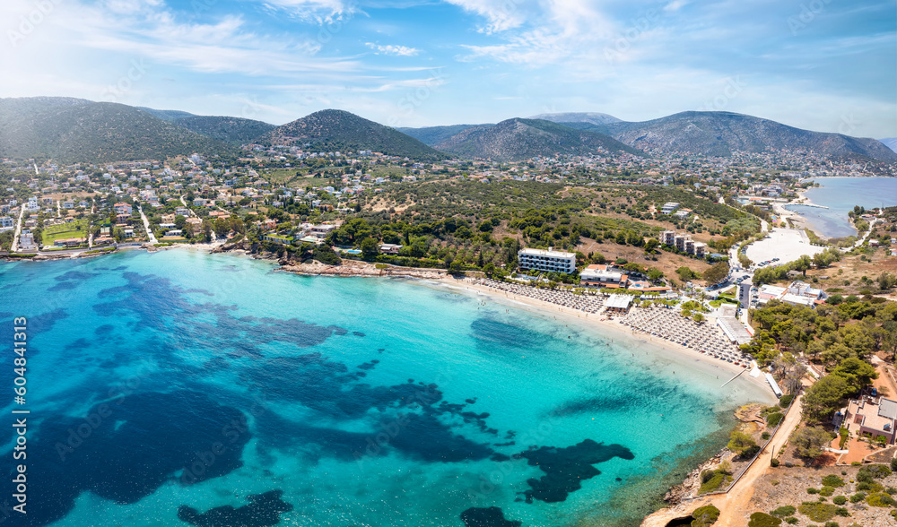 Aerial view of the beautiful bay of Avlaki at Porto Rafti, Attica, Greece, with turquoise sea and sand beaches
