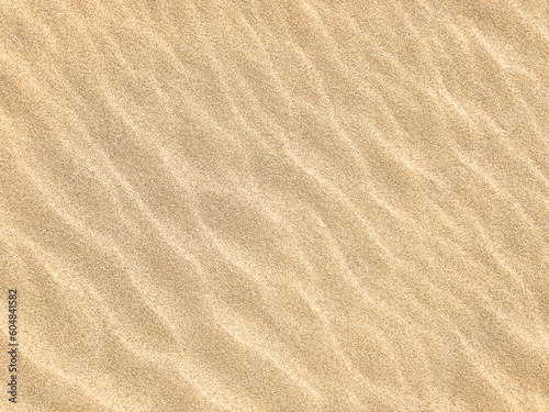 Sand. Texture, surface of sea sand. Natural background. Waves of sand. Seascape. Dunes. Copy space 