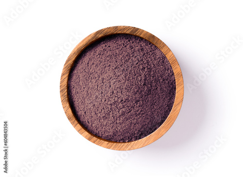 Blackberry powder in wooden bowl isolated on white background. Top view, flat lay. photo