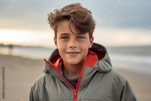 Medium shot portrait photography of a satisfied kid male wearing a lightweight windbreaker against a serene beach background. With generative AI technology © Markus Schröder