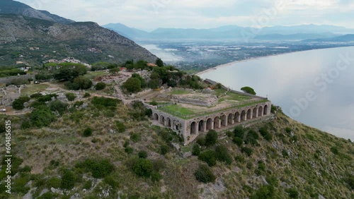 This aerial drone video shows the tempio di giove anxur in Terracina, Italy. The old temple is located on the mountain and has a beautiful view over the sea.  photo