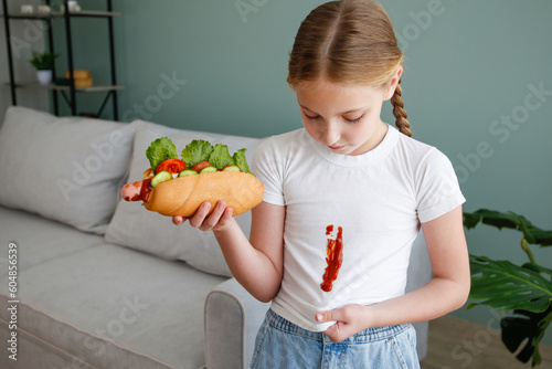 Photography The child stained his clothes with ketchup