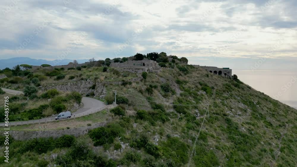 This aerial drone video shows the tempio di giove anxur in Terracina, Italy. The old temple is located on the mountain and has a beautiful view over the sea. This aerial drone video shows the tempio di giove anxur in Terracina, Italy. The old temple is located on the mountain and has a beautiful view over the sea.