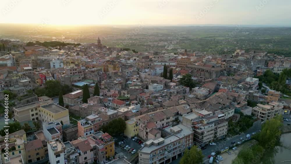 This aerial drone video shows the italian city of Tivoli which is located near Rome in the province of Lazio, central Italy. There are many apartment buildings in this residential area. This aerial drone video shows the italian city of Tivoli which is located near Rome in the province of Lazio, central Italy. There are many apartment buildings in this residential area.
