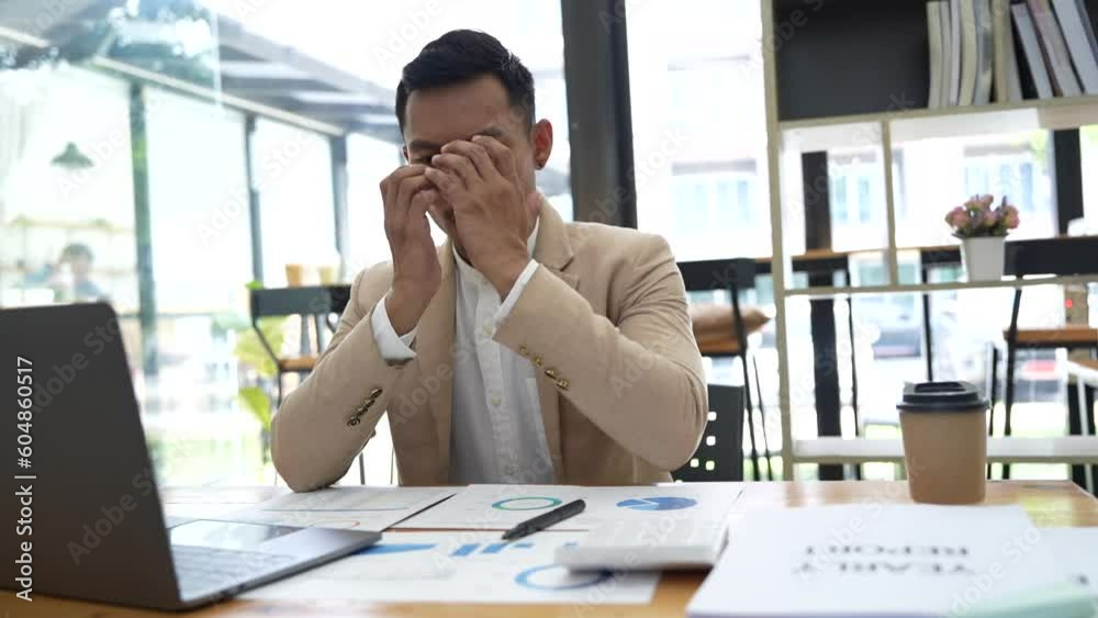 Stressed business man feels frustrated by data loss using laptop at work. Shock use looks at computer screen reads bad news, has unexpected online website problem sitting at office desk Stressed business man feels frustrated by data loss using laptop at work. Shock use looks at computer screen reads bad news, has unexpected online website problem sitting at office desk