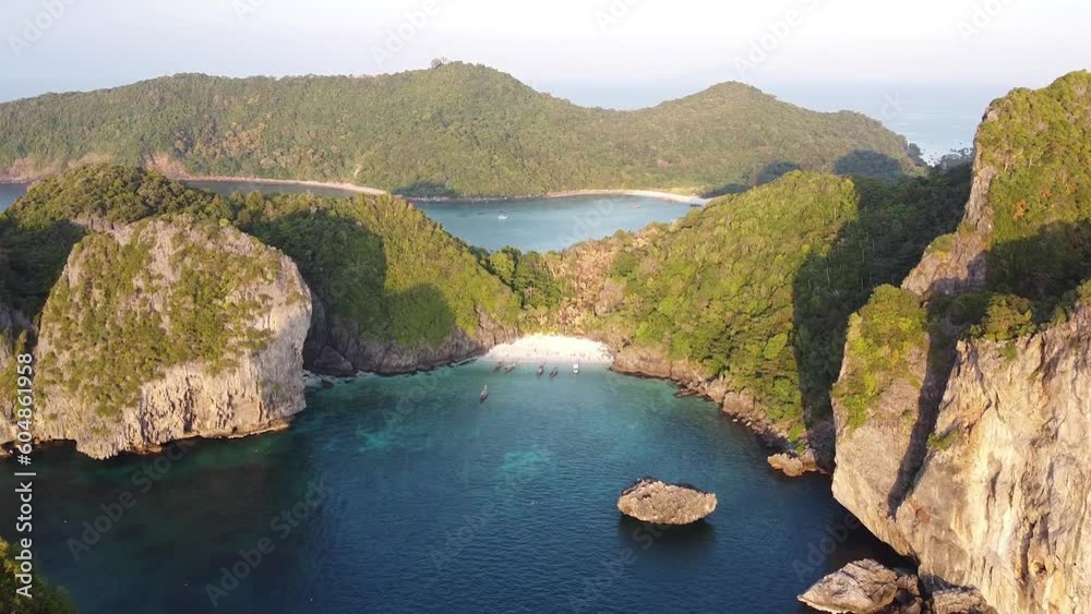Phi Phi Don, Thailand. Aerial view of famous Nui Beach at sunset Phi Phi Don, Thailand. Aerial view of famous Nui Beach at sunset