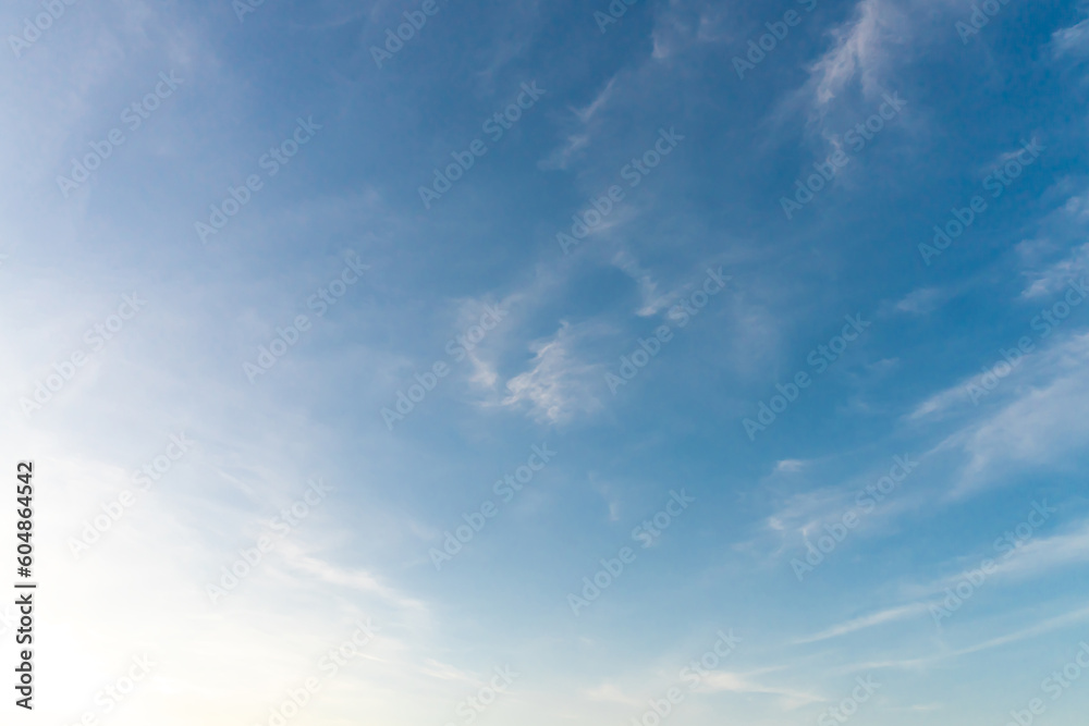 Beautiful blue and yellow sky with strange shape of clouds in the morning or evening taken at the sea Beautiful blue and yellow sky with strange shape of clouds in the morning or evening taken at the sea