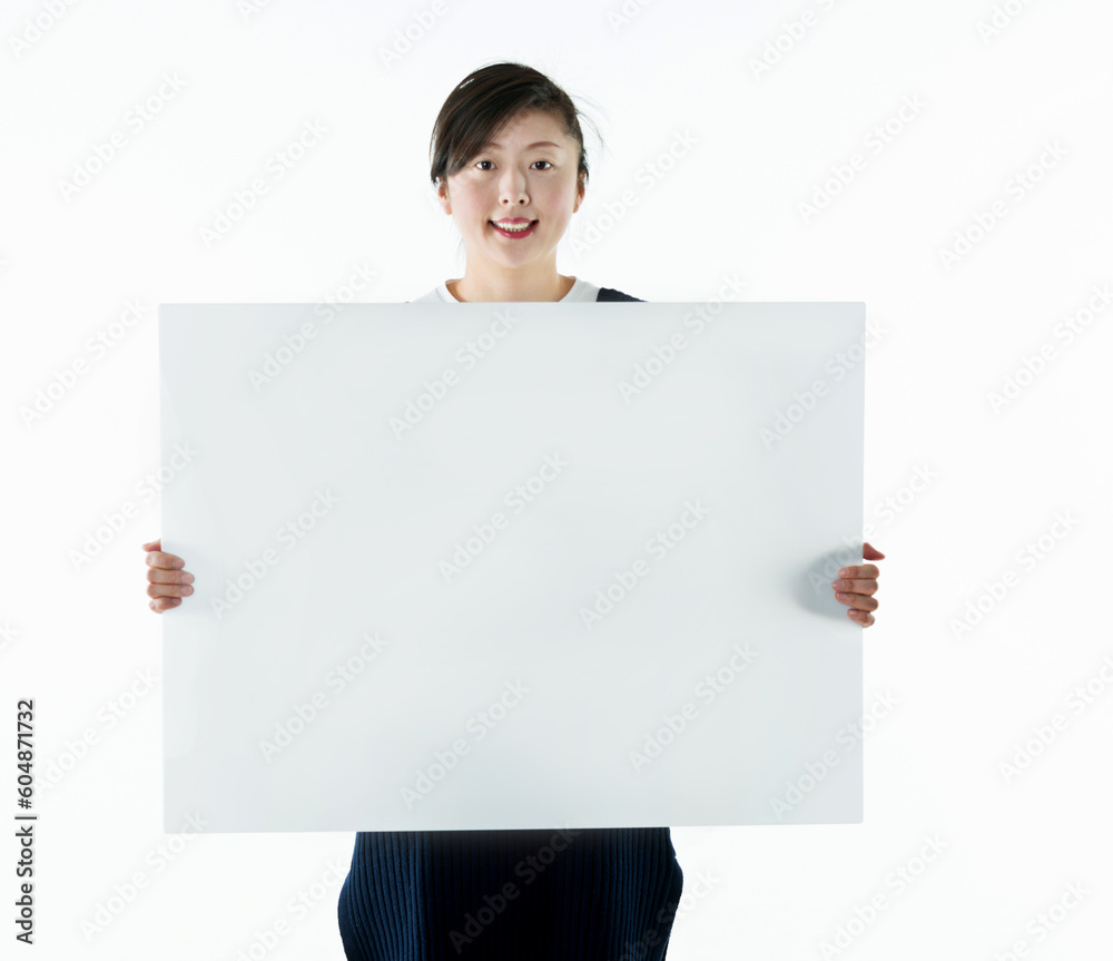Beautiful asian woman holding a blank board isolated on white background Beautiful asian woman holding a blank board isolated on white background