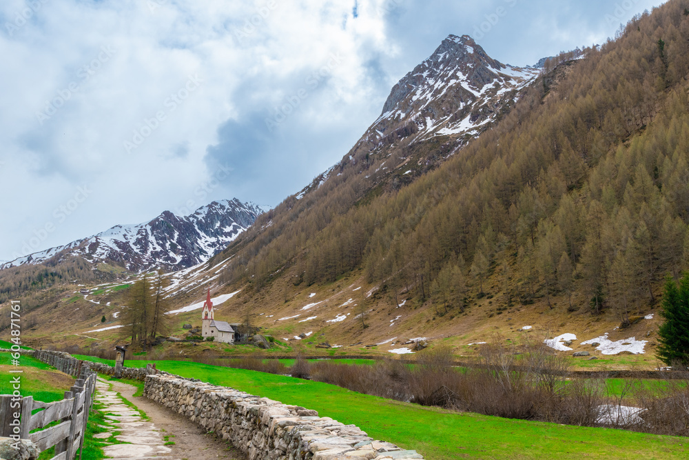 Hiking path towards the Holy Spirit Church at Kasern, Val Pusteria in the italian Alps Hiking path towards the Holy Spirit Church at Kasern, Val Pusteria in the italian Alps