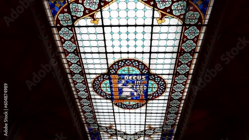 Blue, red and yellow stained glass skylight in Lello e Irmao bookstore, Porto photo