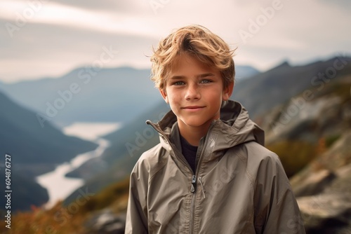 Medium shot portrait photography of a satisfied mature boy wearing a lightweight windbreaker against a scenic mountain trail background. With generative AI technology © Markus Schröder