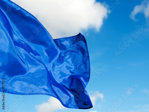 Photography Blue flag waving on sky