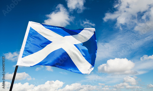 Scottish flag flying on windy photo