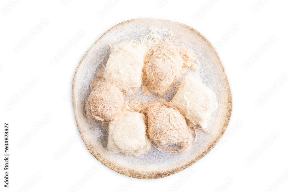 traditional arabic sweets pishmanie isolated on white, top view. traditional arabic sweets pishmanie isolated on white, top view.