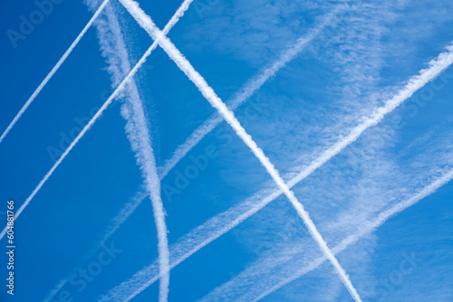 Cloudscape showing trailsl left by airplanes ft by aircraft or with the name of chemtrails.
