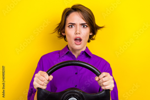 Fényképezés Portrait of impressed crazy person open mouth arms hold wheel staring speechless