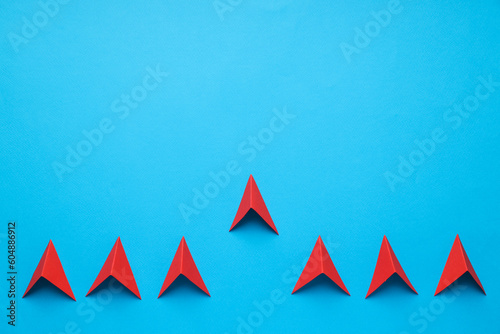 Foto Business, startup and sponsorship concept with arrows on blue background