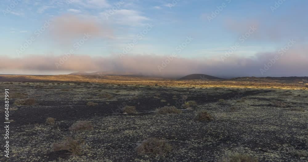 Video over the barren volcanic Timanfaya National Park on Lanzarote at sunrise Video over the barren volcanic Timanfaya National Park on Lanzarote at sunrise
