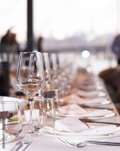 table setting at the event. clean glasses on the table