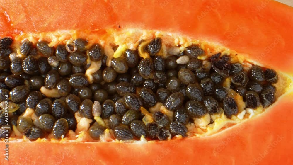 Probe lens reveals mesmerizing details of a half papaya in macro video, vibrant orange flesh, intricate textures, and captivating seed patterns. Macro video shot with laowa 24mm probe lens. 4K
Probe lens reveals mesmerizing details of a half papaya in macro video, vibrant orange flesh, intricate textures, and captivating seed patterns. Macro video shot with laowa 24mm probe lens. 4K