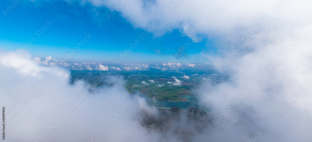 Obraz premium View through the cloud cover to Lake Kochelsee