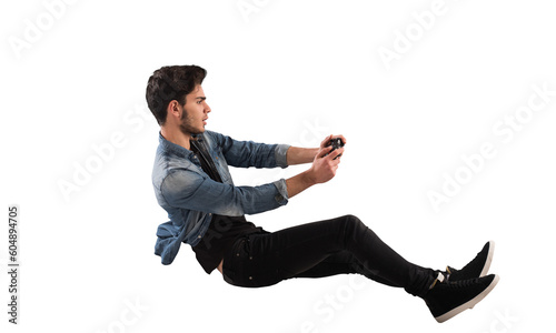 Young man with game controller plays with a video game