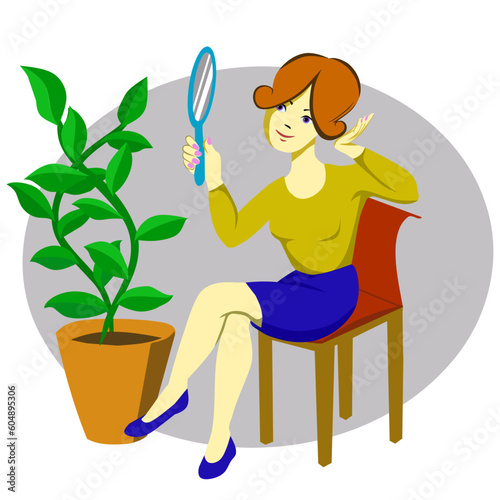 The girl looks in the mirror at her reflection and straightens her hair. She is sitting on a chair next to a houseplant.
