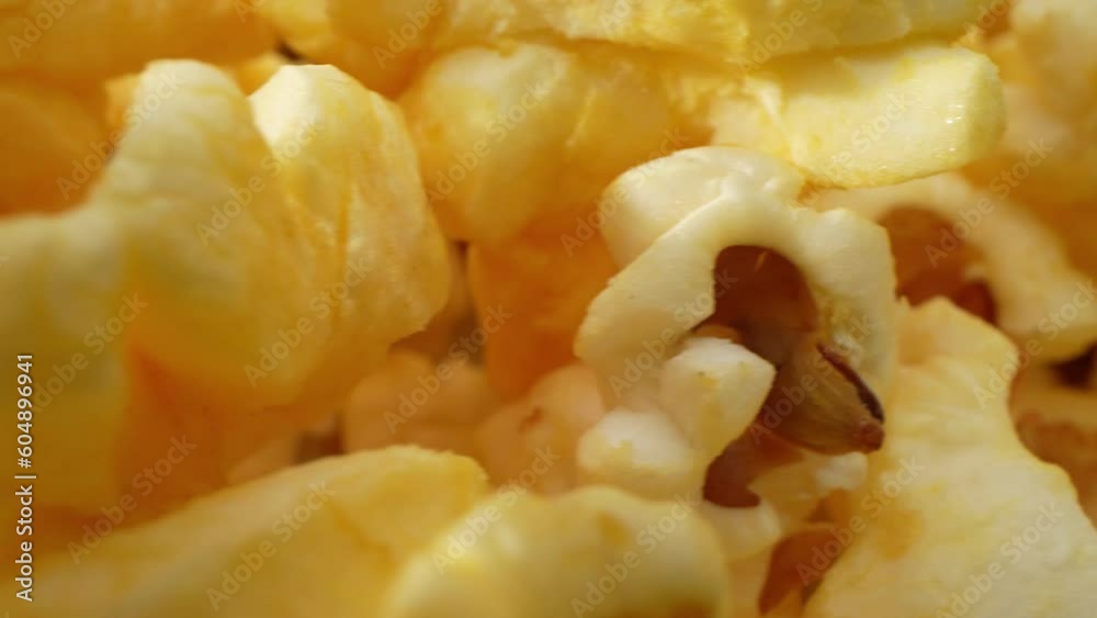 A captivating macro shot with a probe lens, scattered popcorn on the floor comes to life. Each popped kernel showcases intricate textures, revealing the golden hue, crispy edges, and tiny crevices.
A captivating macro shot with a probe lens, scattered popcorn on the floor comes to life. Each popped kernel showcases intricate textures, revealing the golden hue, crispy edges, and tiny crevices.