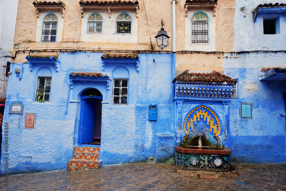 Traditional fountain in Chefchaouen, the blue city in Morocco old town.