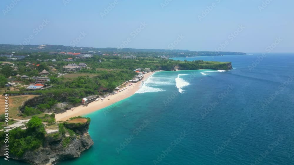 Balangan Beach is one of Bali's most scenic spots, featuring a gorgeous half-kilometer stretch of golden sand between vegetated limestone cliffs. Balangan Beach is one of Bali's most scenic spots, featuring a gorgeous half-kilometer stretch of golden sand between vegetated limestone cliffs.