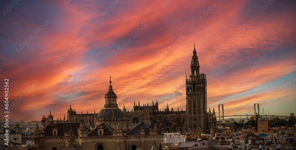 Fototapeta premium Panorama view of the Seville Cathedral (Catedral de Santa Maria de la Sede de Sevilla) view from the observation platformcity skyline with sunset view Seville Cathedral ,Spain