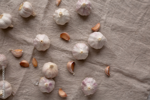 Wallpaper Mural Raw Organic White Garlic Bulbs on a cloth, top view. Flt lay, overhead, from above. Copy space. Torontodigital.ca
