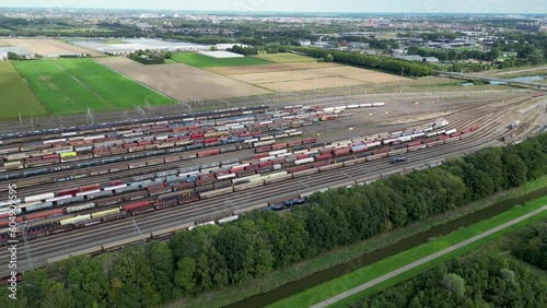 Aerial drone video of freight trains and railway tracks in the Netherlands photo