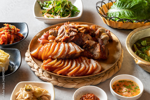 Jokbal, pork feet, steamed, salted oysters, spicy, noodles, garlic Korean food dish  photo