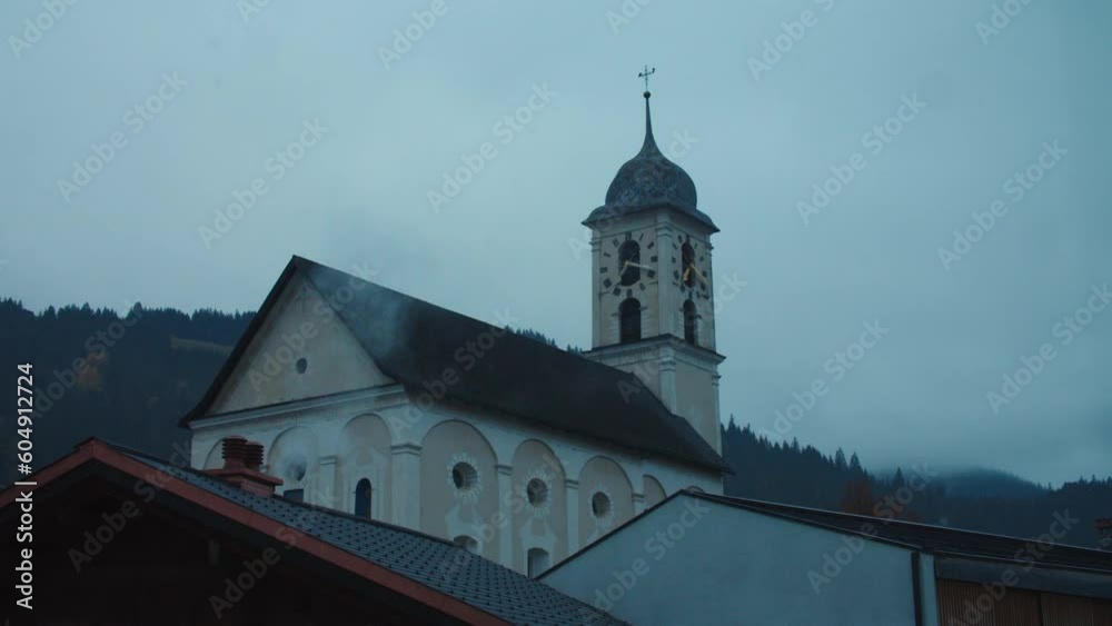 Time lapse 24h church with clouds & sun - Laax, Switzerland - Graded Time lapse 24h church with clouds & sun - Laax, Switzerland - Graded