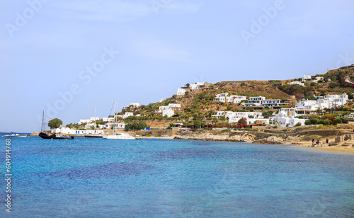 Mykonos is a small Island of the Coast of Greece. The hilly coastline is adourned with white washed cottages. It is a very popular tourist destination.