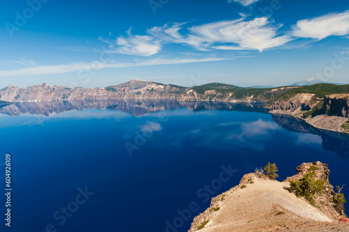 Reflections of clouds and sky in Crater Lake, Oregon, USA