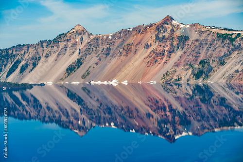 Scenic view of Crater lake with snow and mountains