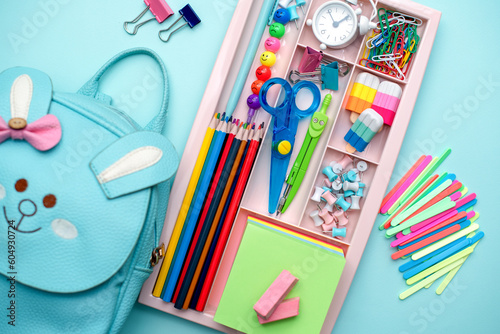 Stylish colored stationery and school supplies in the organizer. Creative organization of stationery storage. Back to school.