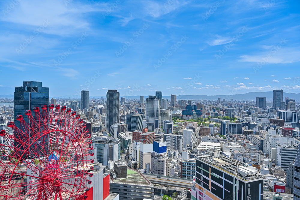 Naklejka premium 青空背景の梅田街並み 【大阪風景写真】