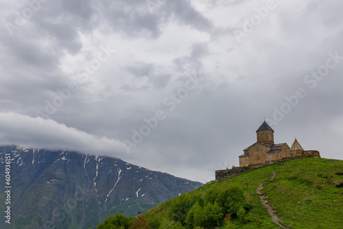 Gergeti Trinity Church near the Stepantsminda village in Georgia ,At an altitude of 2170 meters, under Mount Kazbek or Kazbegi, 